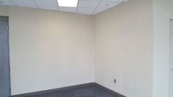 An empty room with white wall- Topeka, KS Interior House Painting Services